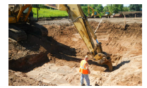 This photo shows heavy equipment work from outside infiltration basin so soils not compacted