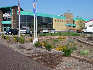 image of permeable pavers and rain garden at Dakotah! ice center