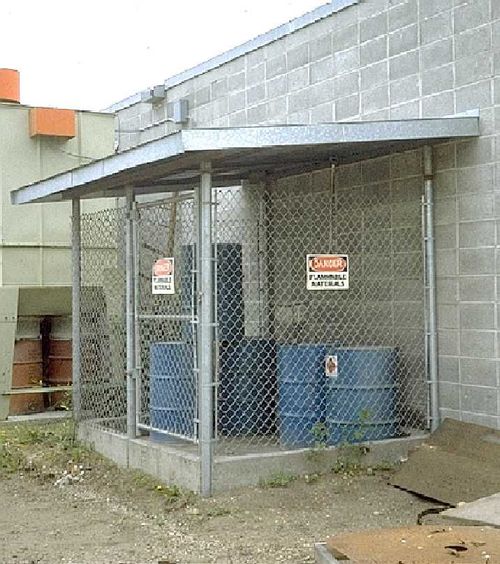 facility with barrels in a storm-resistant shelter
