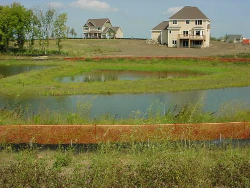 photo showing a construction site with sediment control practices