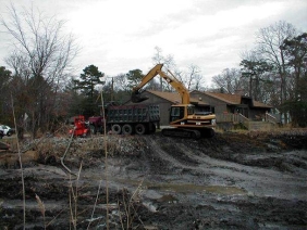 Example of a site where vehicle traffic occurred within the infiltration practice, resulting in soil compaction and ponding of water.